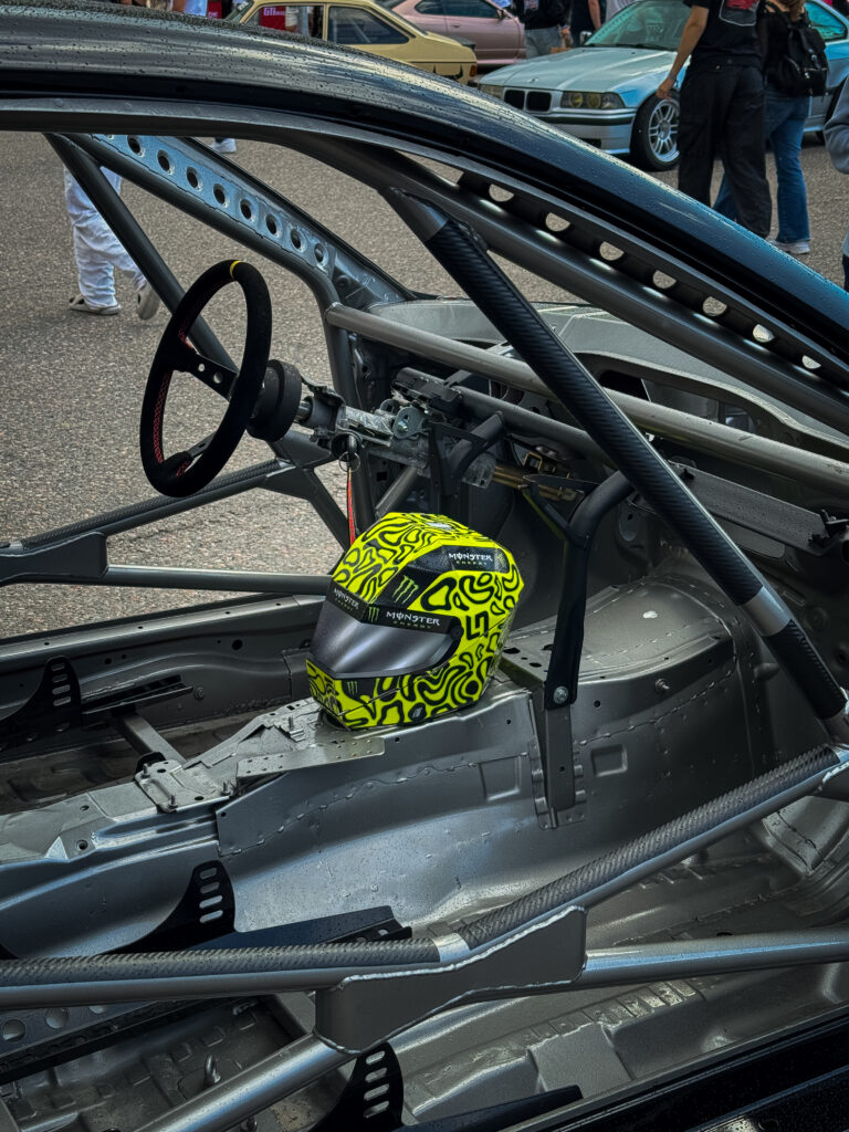 Lando norris monster helmet inside a racing car